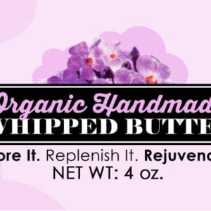 A purple flower with the words organic handmade whipped butter.