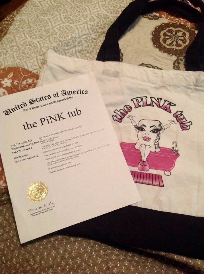 A bag and certificate of interest for the pink tub.