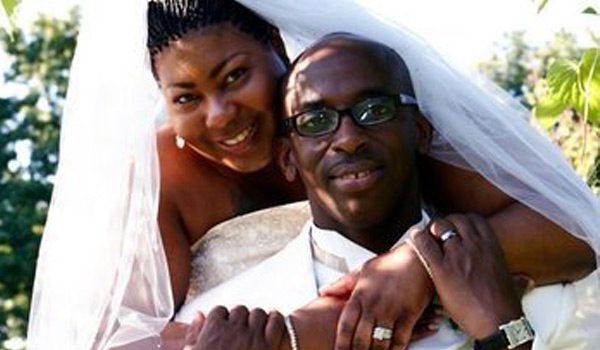 A man and woman posing for the camera.